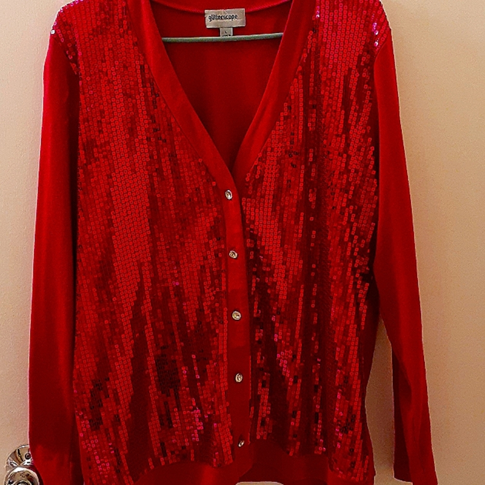 Sequin light weight, long sleeve top with cz buttons.  Wear open or buttoned.